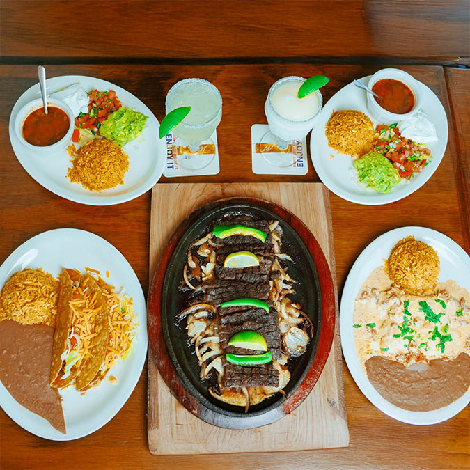 Mexican dishes and margaritas at Maria Mia Tex-Mex Cantina Restaurant Bar in College Station, Texas.