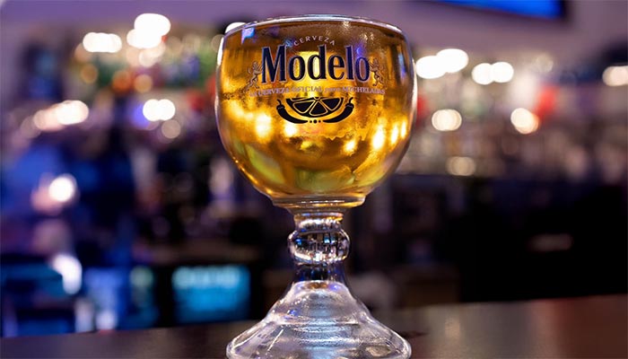 A goblet-style glass of Modelo at Maria Mia Tex-Mex Cantina Bar, College Station, Texas.